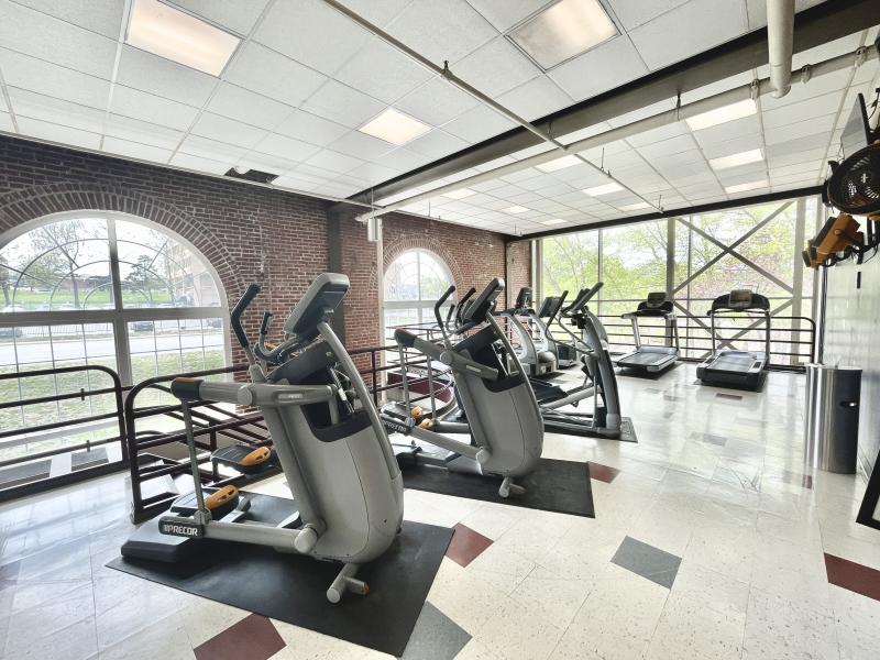 The Sermon Center cardio room with some fitness equipment.